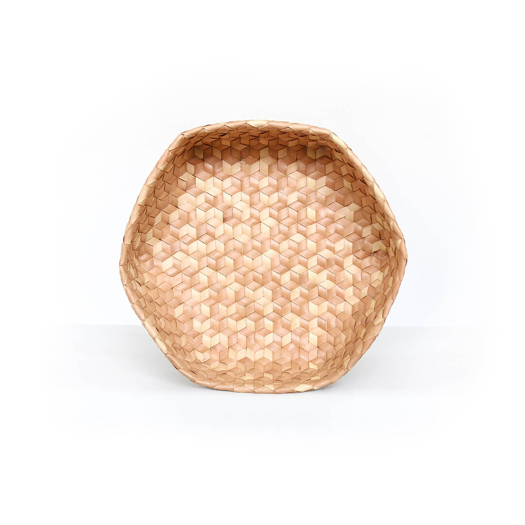 Handwoven palm leaf container with hexagonal shape and intricate geometric pattern, showcasing natural beige color and traditional Indonesian craftsmanship, suitable for multi-purpose storage or wall decor